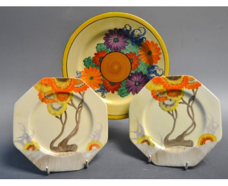 A pair of octaganol Clarice Cliff Bizarre side plates, honeyglazed pattern, for Wilkinson, circa 1935; a Clarice Cliff Bizarr