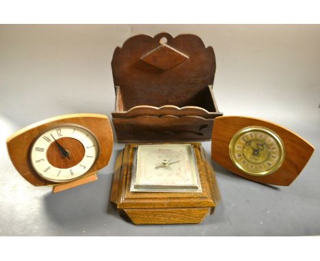 An Art Deco Oak wall barometer;  a vintage clock;  another;  a letter rack (4)