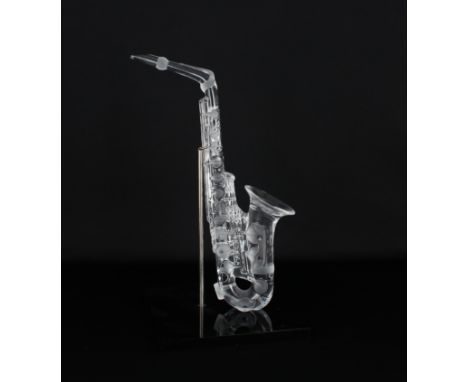 Royales de Champagne Crystal Saxophone. Signed, comes with original box and display.Figurine Dimensions: 13.75 x 9.5 in.Overa