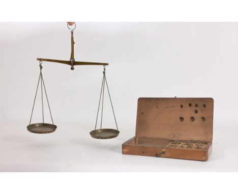 Antique Brass Hand Balance Scale w/ Weights and original case.Case Dimensions: 1.75 x 7.5 x 4.25 in.