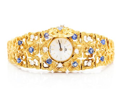 A circa 1960's 18ct yellow gold organic form bracelet dress watch, set with sapphires and diamonds, the centre with sprung co