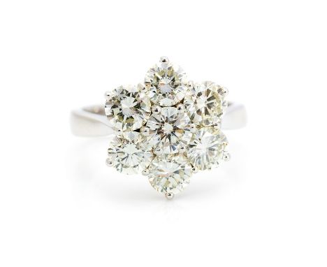 A diamond flowerhead cluster 18ct white gold ring, seven round brilliant-cut diamonds, total diamond weight approx 2.75cts, a