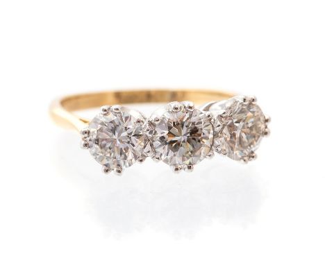 A diamond three stone 18ct gold ring, comprising three round  brilliant cut diamonds with a total diamond weight approx. 2.5 