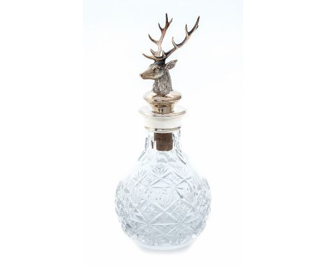 An Elizabeth II silver mounted glass liquer decanter, the silver detachable stopper cast as a Stag's Head, by Harrison Brothe