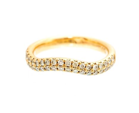 A diamond set 18ct rose gold ring, the shaped half hoop band grain set with a double row of a total of thirty-eight brilliant