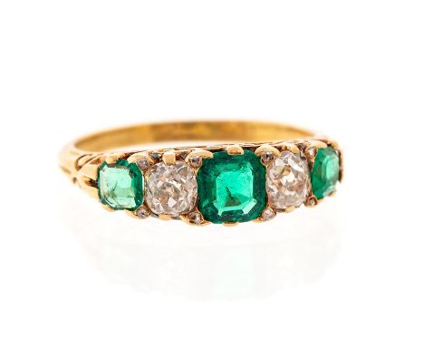 ****AUCTIONEER TO ANNOUNCE EMERALD WEIGHT CHANGED DUE TO TYPO TOTAL EMERALD WEIGHT APPROX 0.90CT ****An emerald and diamond f