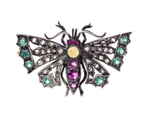 A gem-set butterfly brooch, the body set with graduated spinels, with a round opal set to the top, each wing tip set with fou