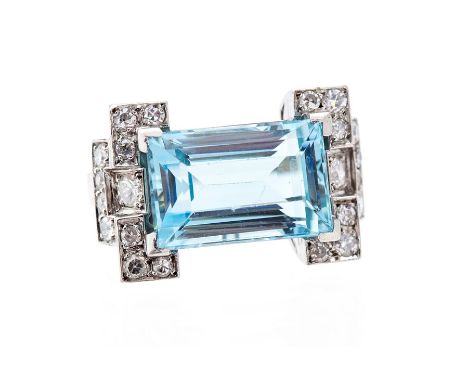 An Art Deco style platinum, aquamarine and diamond ring, the rectangular step cut aquamarine accompanied by a G.C.S identific