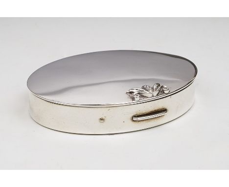 A Georg Jensen oval compact, the cover with raised stylised bud finial, fitted interior, the engine turned stamped: Georg Jen