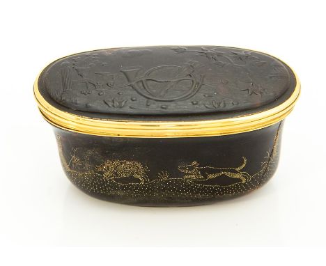 A 19th century tortoiseshell oval snuff box, carved and inlaid with hunting scenes, approx 8cm long