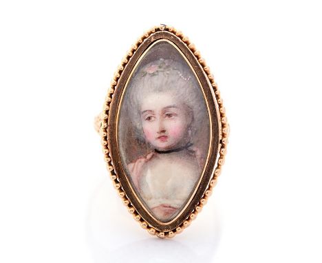 A late 18th century yellow gold navette shaped sentimental ring, set with a portrait miniature of a lady in a pink dress, bea