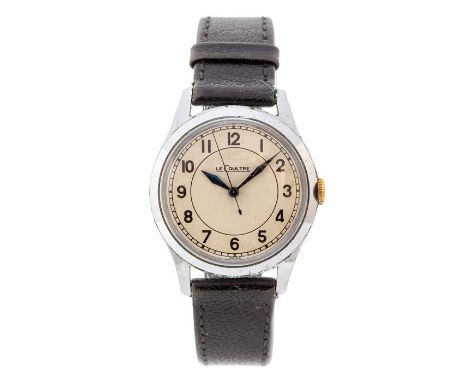 Jaeger Le Coultre, a circa 1950's gents steel Jaeger Le Coultre wristwatch, 3cm circular champagne dial with blued dagger han