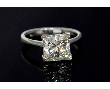 A diamond solitaire 18ct white gold ring, the princess cut diamond accompanied by and E.G.L report stating a  weight approx 2