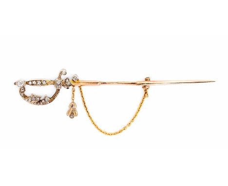 A Victorian diamond set jabot pin in the form of a sword, the scroll hilt decorated with rose cut diamonds with top terminal 