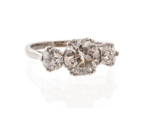 A diamond three-stone platinum ring, three round brilliant-cut diamonds, centre diamond weighing approx 2 carats, assessed co