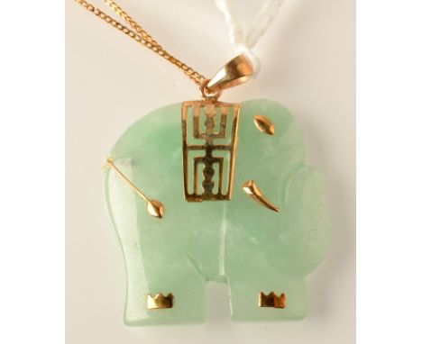 A Chinese jade, gold mounted pendant and chain.