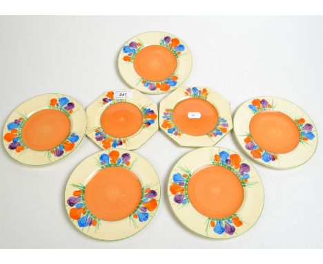 Five Clarice Cliff "Crocus" pattern plates, 16.4cm. diameter, together with a pair of Clarice Cliff "Crocus" pattern octagona