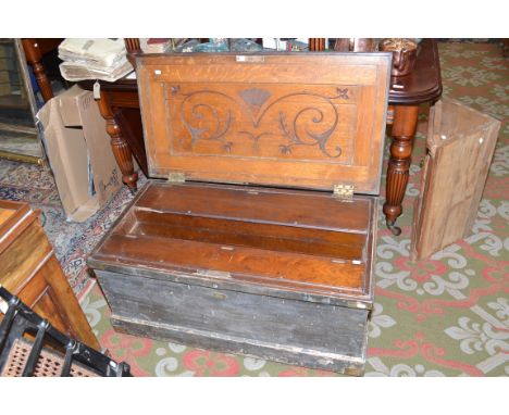 A good carpenters' oak tool chest, the interior with sliding and stacked fitted trays, the whole with brass mounts and iron c