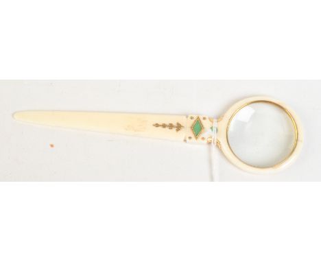 A fine ivory magnifying glass/letter opener mounted with engraved gold and set with jade.