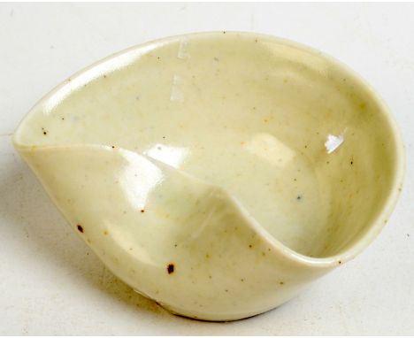 A Bernard Leach porcelain soy dish, celadon glazed and with folded rim, personal and pottery seals, width 7.5cm.  Condition R