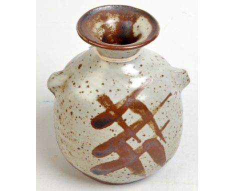 A Janet Leach small stoneware vase with iron brushwork and twin lug handles, impressed personal and pottery seals, height 10c