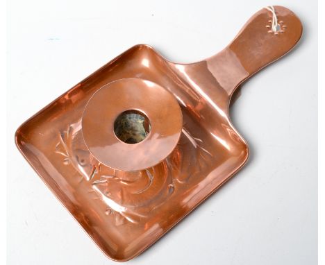 A Newlyn copper chamber stick, decorated with fish. Impressed mark. 