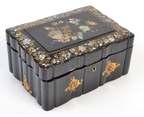 An early Victorian papier mache work box, decorated with gilding and mother of pearl. 