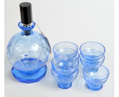 A Czechoslovakian blue glass, Art Deco decanter and seven matching glasses. 