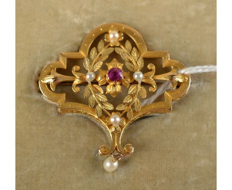 A  matt engraved gold Belle Epoch brooch with a ruby and pearls. Retailed by
Carassale Hermanos, Florida, Buenos Aires and Pa