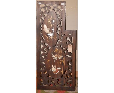 A Japanese panel pierced and inset with bone, mother-of-pearl and with lacquer. 35.5 x 82 cm