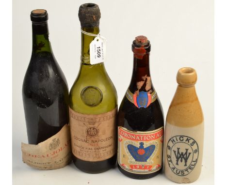 Mixed lot: an empty, cracked bottle of Cognac Napoleon, 1811, an empty Hicks St. Austell Brewery ceramic bottle, a St Austell