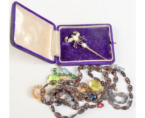 An opal set scorpion brooch and costume jewellery.