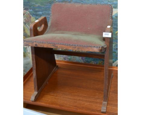 An Art Deco dressing stool.