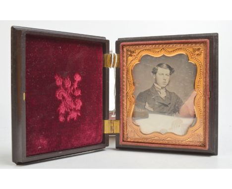 A daguerreotype portrait of a young gentleman in Union type case.