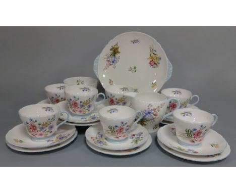 A SHELLEY WILD FLOWERS PART TEA SERVICE, pattern No.13668, comprising seven trios, jug, sugar bowl and bread and butter plate