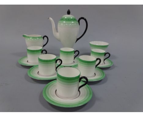 AN ART DECO STYLE WEDGWOOD COFFEE SERVICE FOR SIX, having graduated green tone banding, black handles and finial to teapot, W