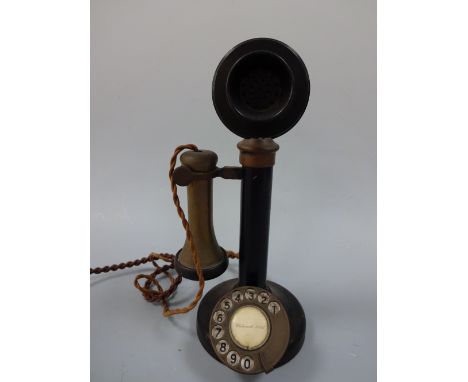 A VINTAGE CANDLESTICK TELEPHONE, with impressed I28-234 No.150 to support and TE 234 No.22 verso, approximately 31cm high