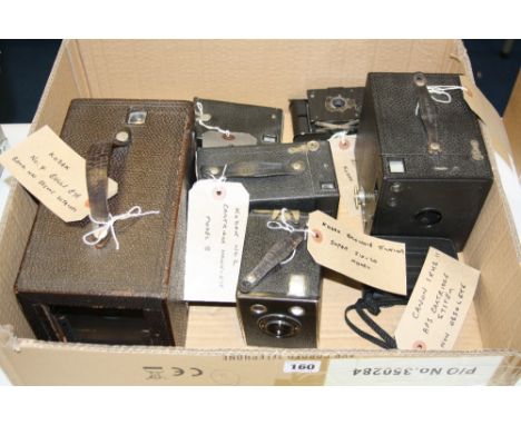 A BOX OF KODAK AND CANON CAMERAS, the Kodaks are a Vest Pocket Autographic, a No.0 Brownie Model A, a No.2 Cartridge Hawk Eye