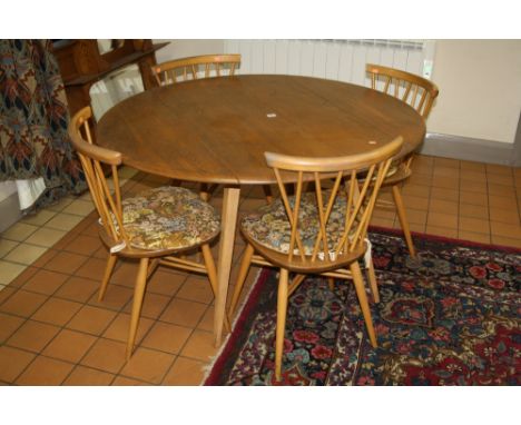 AN ERCOL ELM AND BEECH CIRCULAR DROP-LEAF TABLE, on splayed tapering square legs, approximately 112cm diameter, together with