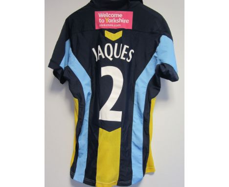 MATCH WORN CRICKET SHIRT         A dark blue with light blue and yellow trim Yorkshire Carnegie short sleeve shirt with Jaque
