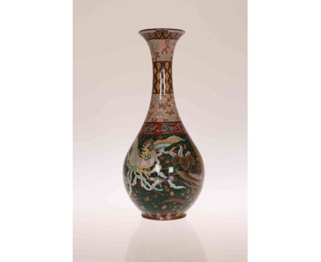 A SMALL JAPANESE CLOISONNE ENAMEL VASE OF FINE QUALITY, Meiji period (1868-1912), the bottle shaped body decorated with four 