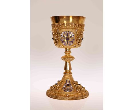 A CONTINENTAL SILVER GILT, ENAMEL AND JEWELLED CHALICE, IN RENAISSANCE STYLE, 20th Century, the bowl with cast bands of beadi