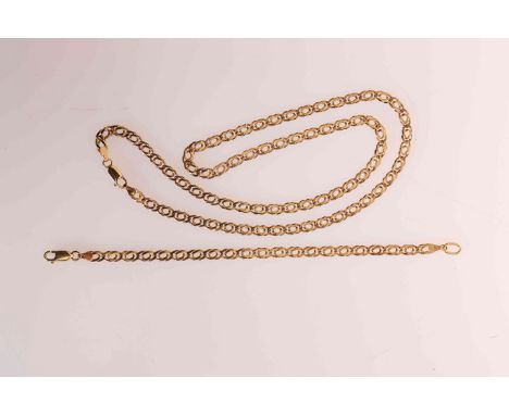 A YELLOW METAL CHAIN, stamped ITALY 9KT; and A YELLOW METAL BRACELET EN SUITE, stamped ITALY 9KT. Gross 27 grams, length of c