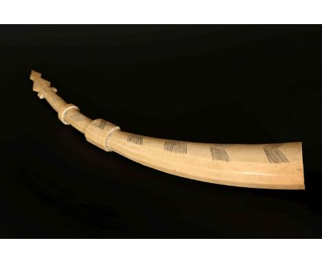 AN IVORY OLIPHANT, PROBABLY MANGBETU, DR CONGO, with incised decoration in an arrow format, with knopped mouthpiece, and diam