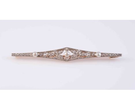 AN EDWARDIAN BELLE EPOQUE DIAMOND AND PEARL BROOCH, CIRCA 1910,  the tapering slender navette shaped mount set to the centre 