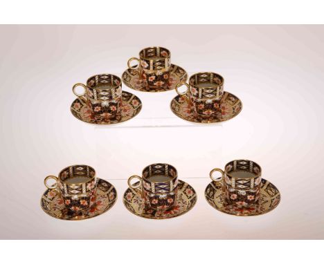 ROYAL CROWN DERBY, A SET OF SIX IMARI PATTERN COFFEE CANS AND SAUCERS, c.1916-17, each decorated to pattern no. 2451, red pri