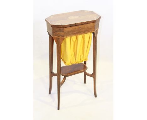 A LATE 19TH CENTURY INLAID ROSEWOOD WORK TABLE, the rectangular top with canted corners over a basket, raised on square-secti