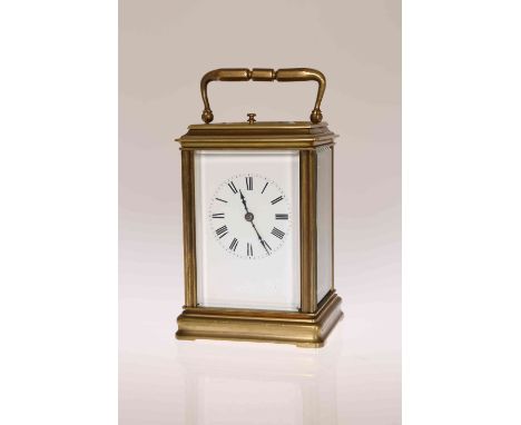 A BRASS GORGE CASED REPEATER CARRIAGE CLOCK, LATE 19TH CENTURY, the white enamel dial with Roman numerals, the movement strik