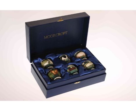ANJI DAVENPORT FOR MOORCROFT, A SET OF SIX FARMYARD ANIMALS EGG CUPS, c.1998, each hand painted and tubelined with different 