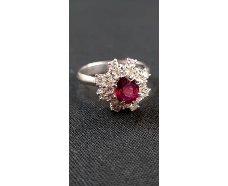 18 CARAT WHITE GOLD RUBY &amp; DIAMOND RING WITH CIRCA HALF CARAT OF DIAMONDS